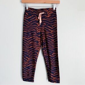 The Upside Malibu tiger zebra tie waist legging navy orange size 8